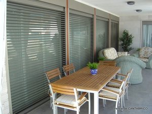Terraza con persianas de lamas orientables GRADHERMETIC