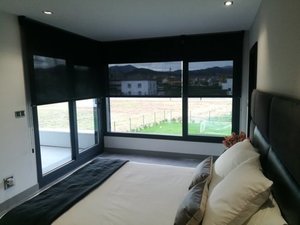 enrollables Bandalux en dormitorio