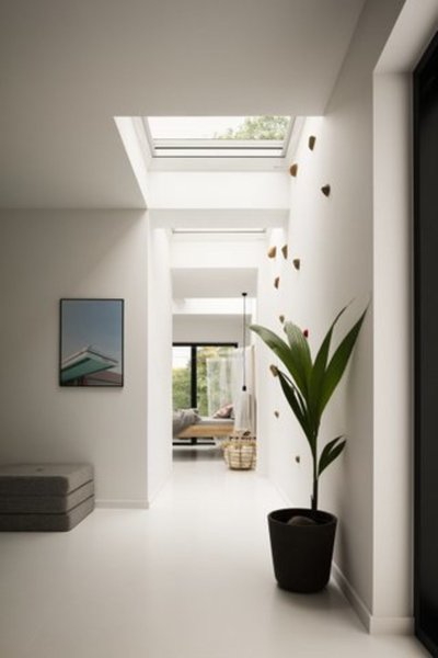 Ventana VELUX cubierta plana en pasillo